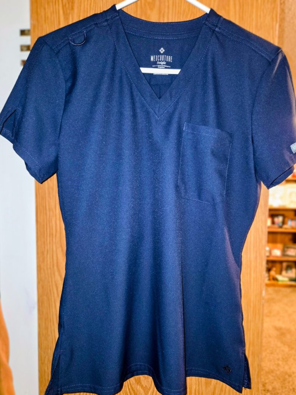 Med Couture Insight women's navy scrub top and bottom